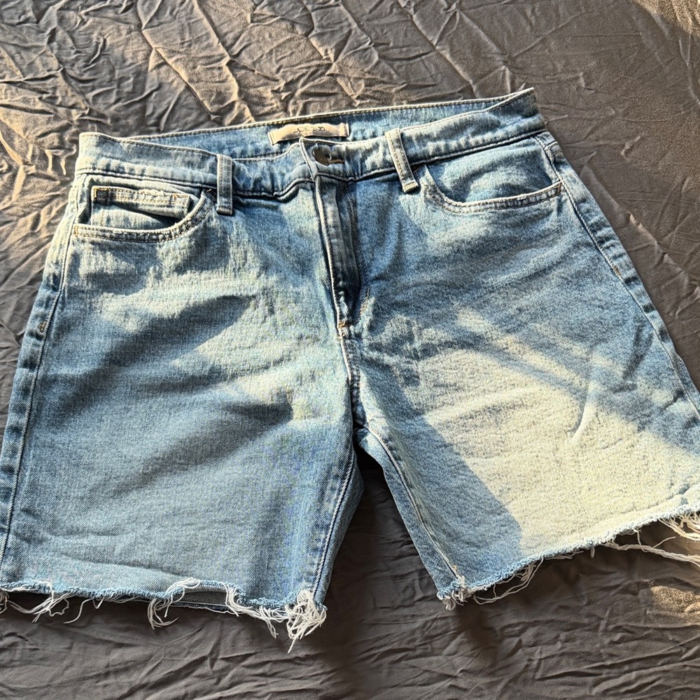 Joe's Jeans light blue denim shorts with tan stitching